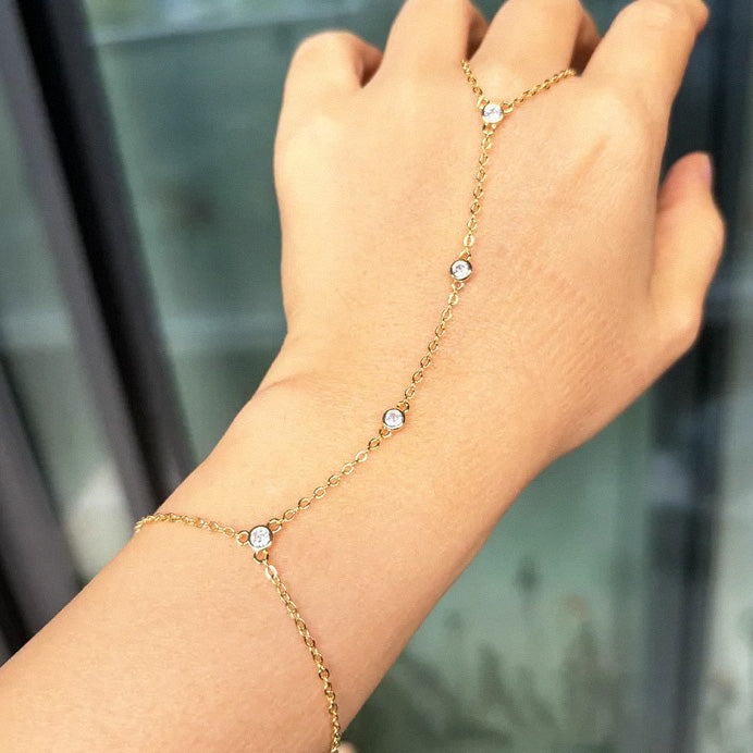 Gold crystal hand chain bracelet styled on hand
