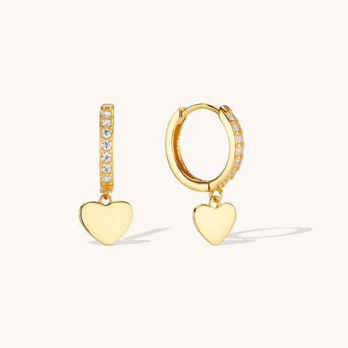 Gold heart dangle huggie earrings with cubic zirconia detailing