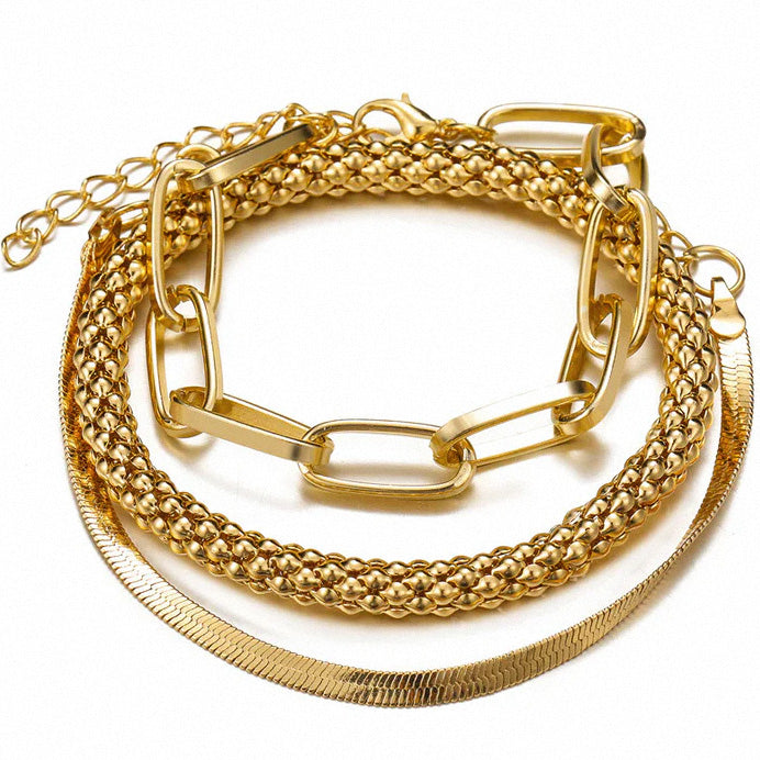 Gold layered bracelet set with paperclip, rope and snake chain design