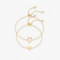 Gold heart duo bracelet set featuring hollow and solid heart charms