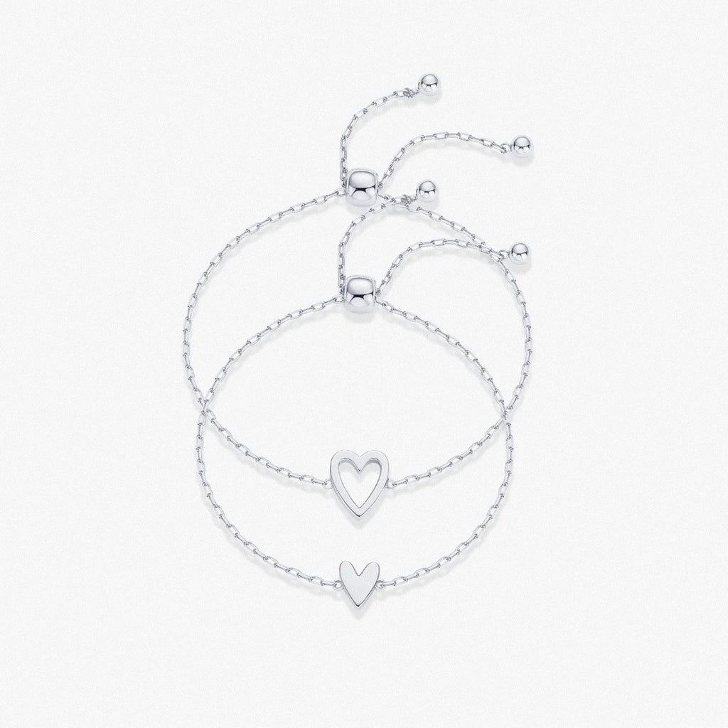 Silver adjustable heart duo bracelet set with hollow and solid heart charms