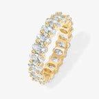 Gold oval-cut eternity band ring with cubic zirconia stones
